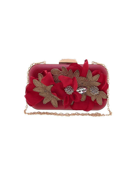 A red floral embellished clutch with a gold-tone chain.