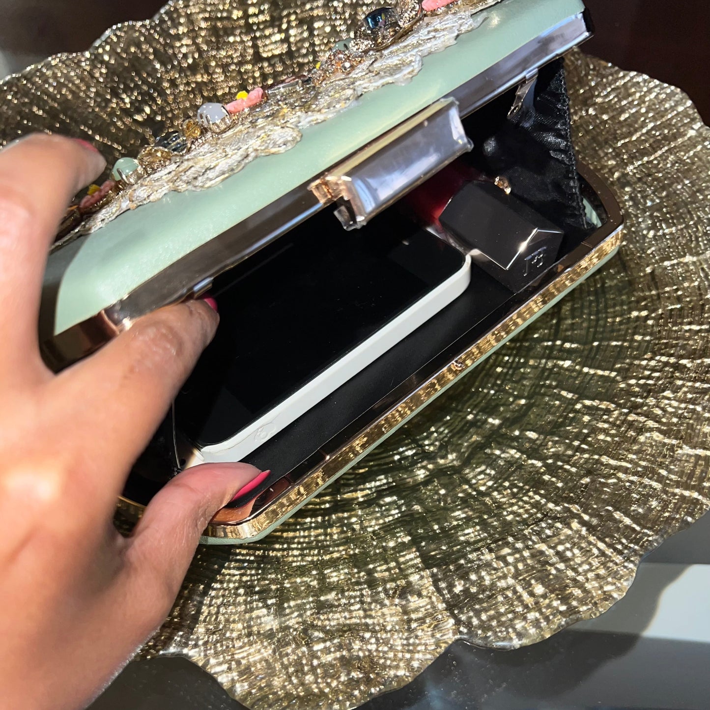 Green embelished clutch