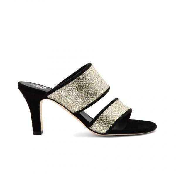 Made of black suede with the two bands in silver gold fabric. The quality of the materials used is unique and comfortable and allows you to wear these shoes all day. 3.15 inches heel